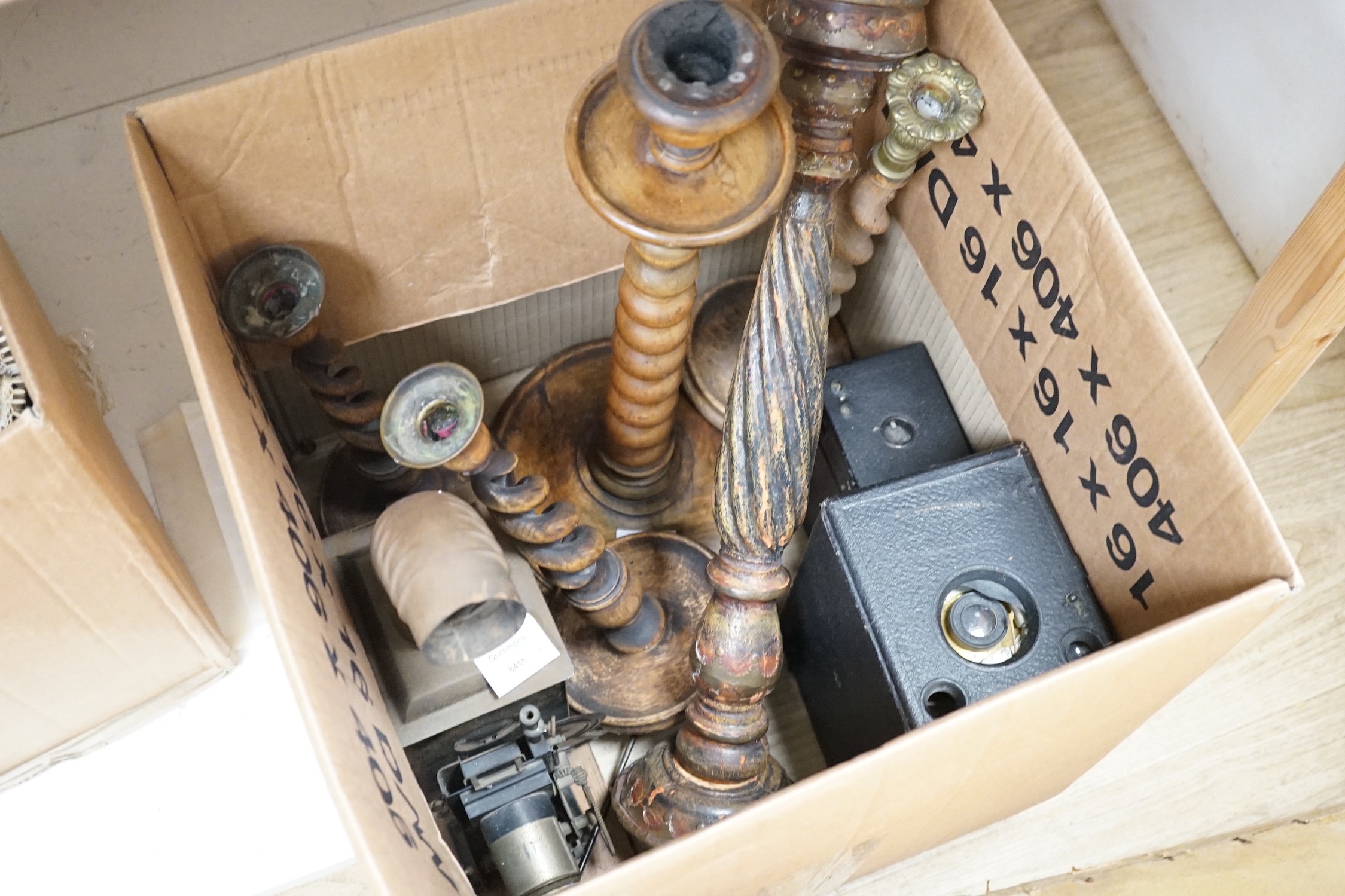 A group of five various wooden candlesticks, two vintage Kodak box cameras and magic lantern slide projector (8)